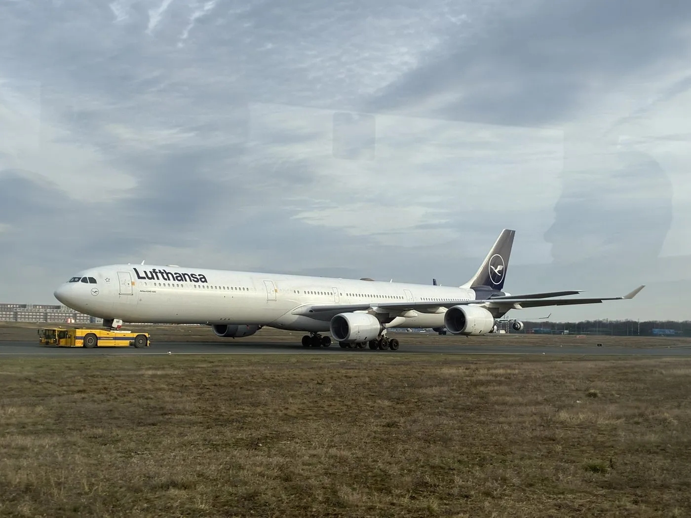 A Lufthansa aircraft parked on the airport apron