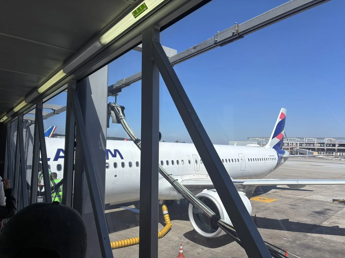 View of an aircraft wing and engine from a window seat